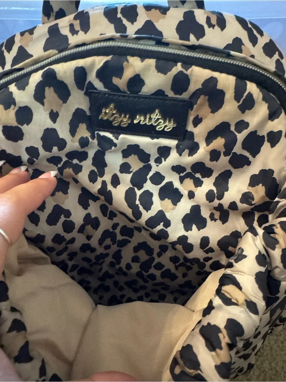 Itzy Ritzy Leopard Print Quilted Backpack - Beige/Black